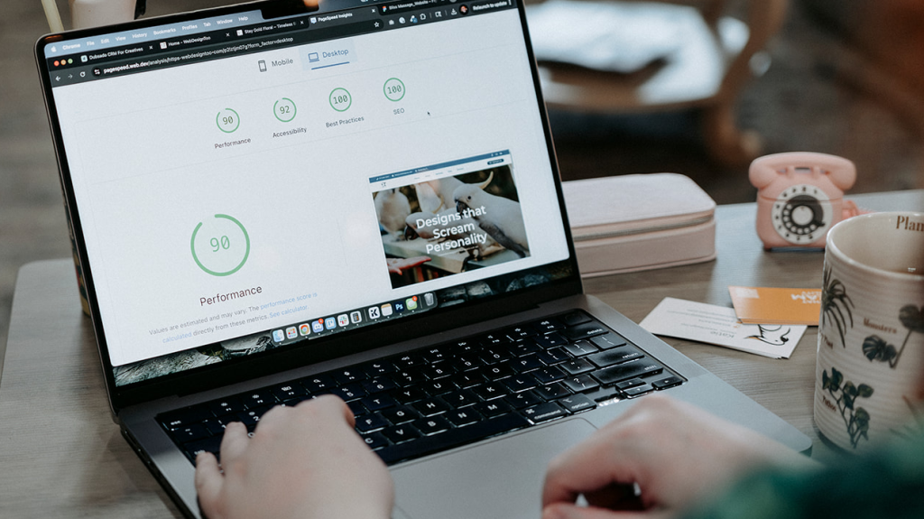 Over-the-shoulder shot of someone checking SEO and site speed for a website